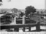 Billy McMurty opens the gates to allow the horse-drawn lighter Violet to pass safely out of the third lock